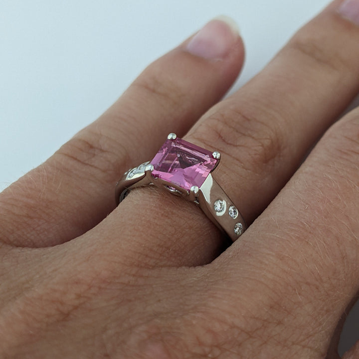 PLATINUM PINK SAPPHIRE PRINCESS CUT 1.41 CARAT TOTAL WITH .12 DIAMOND TOTAL WEIGHT FLUSH SET ESTATE RING 6.0 GRAMS