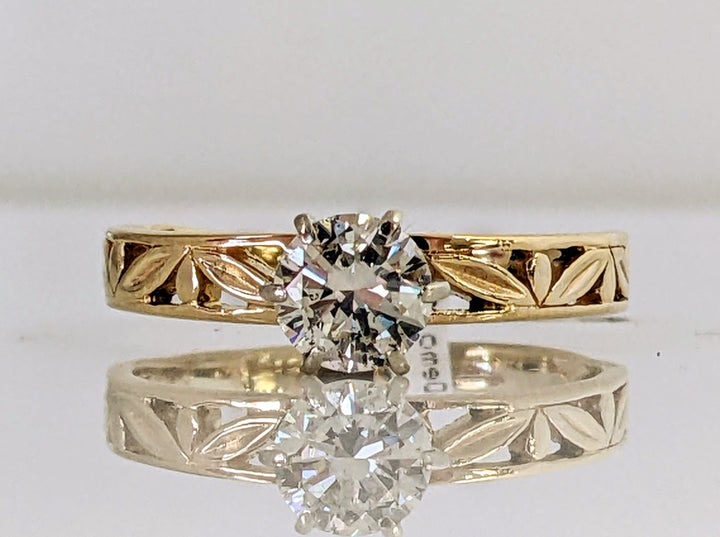 14K .60 CARAT TOTAL I1 K DIAMOND ROUND WITH FANCY SHANK ESTATE RING 2.3 GRAMS