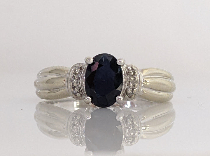 10KW SAPPHIRE OVAL 5X7 WITH 6 MELEE ESTATE 3.4 GRAMS