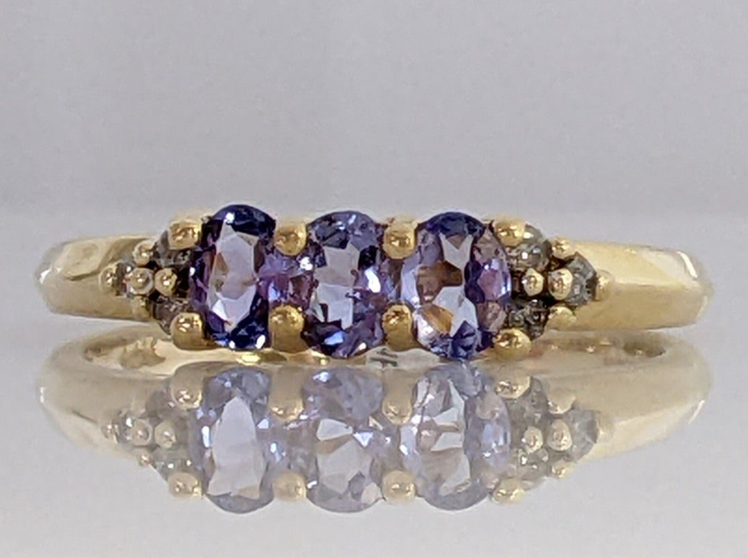 14K TANZANITE OVAL (3) 3X4 WITH .06 DIAMOND TOTAL WEIGHT 2.1 GRAMS