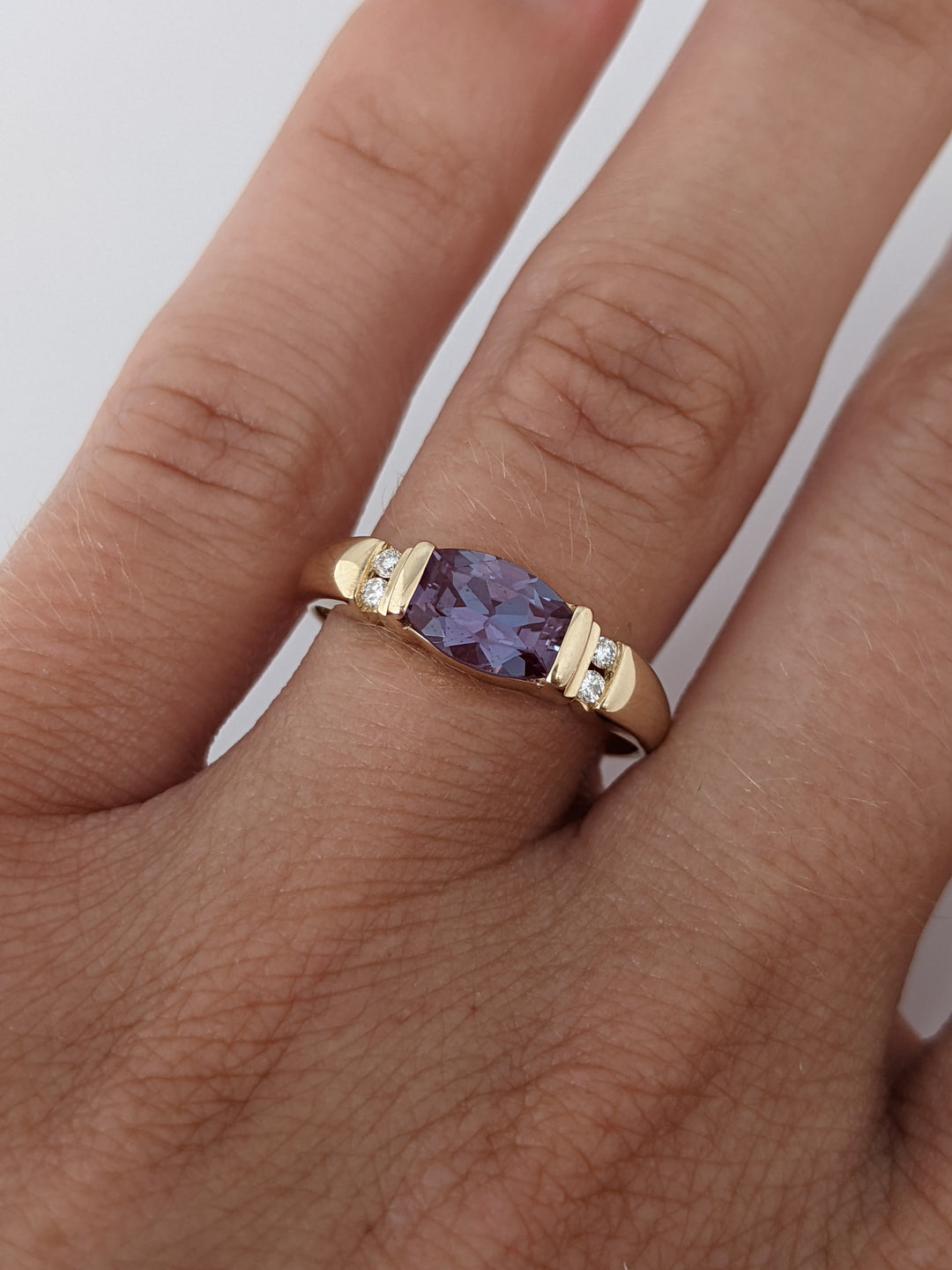 14K ALEXANDRITE OVAL 5X7 WITH MELEE 2.7 GRAMS