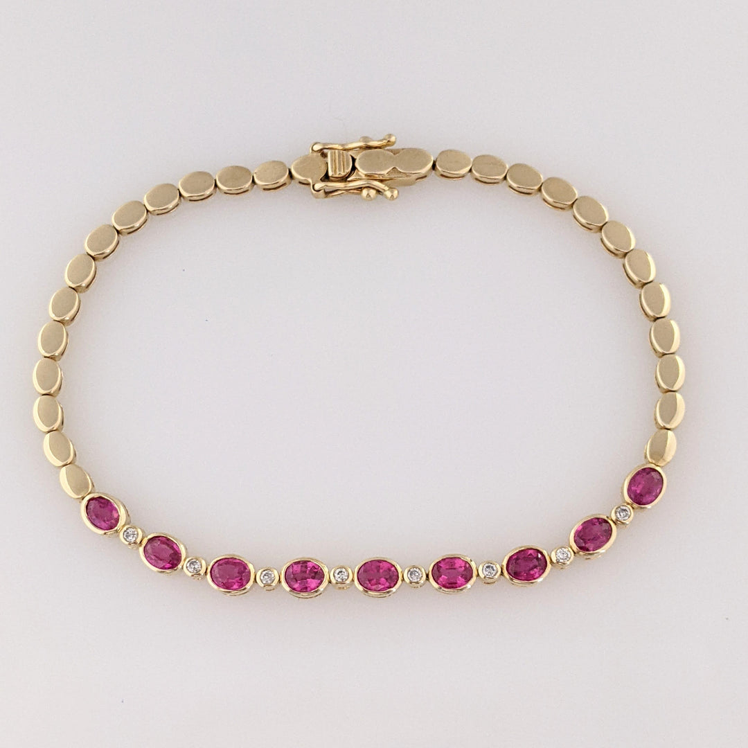 14K RUBY OVAL 3X4 (9) WITH .12 DIAMOND TOTAL WEIGHT ESTATE BRACELET 8.0 GRAMS