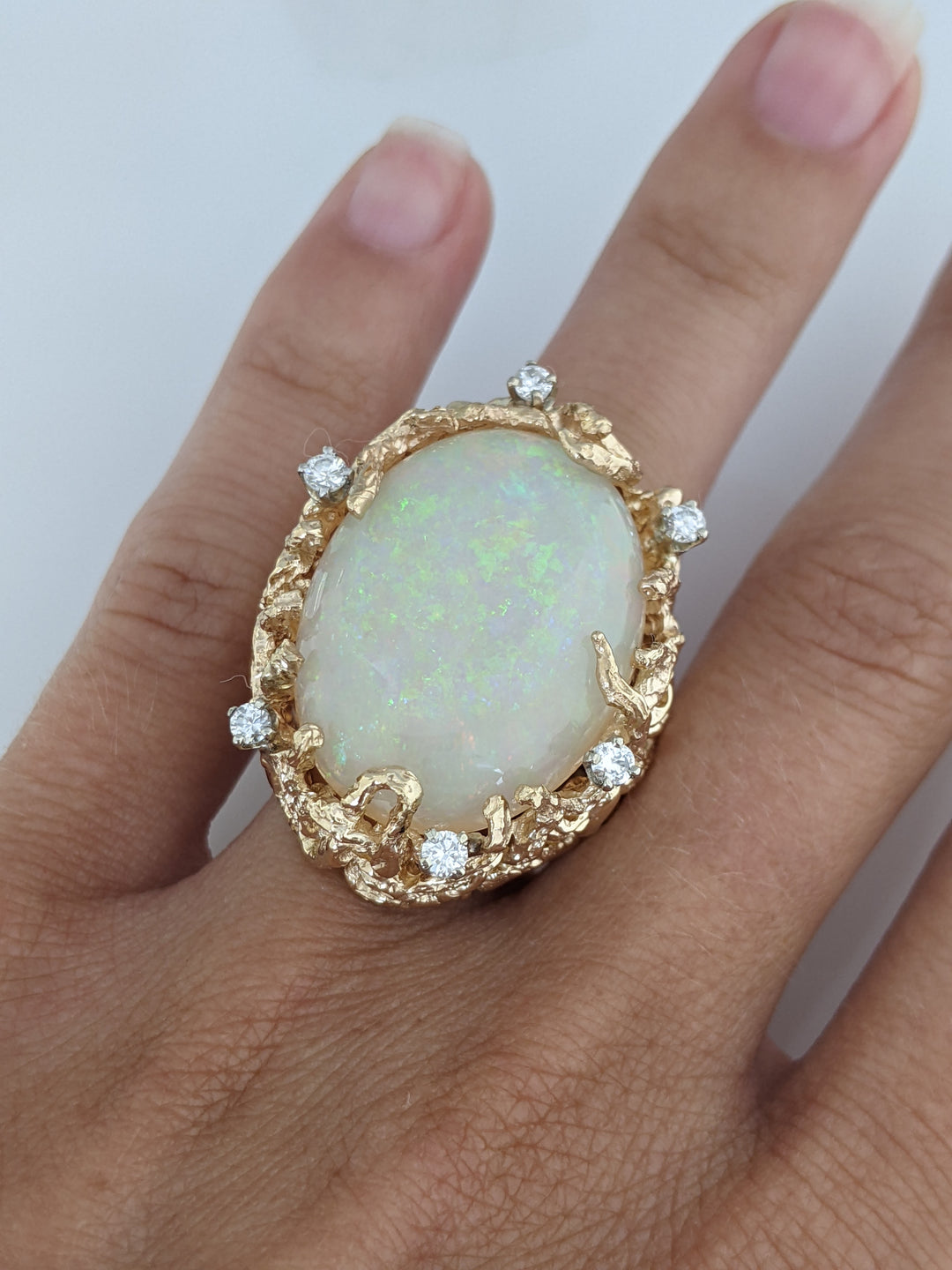 14K OPAL OVAL 18X27 WITH .30 DIAMOND TOTAL WEIGHT OPEN SHANK 23.6 GRAM RING