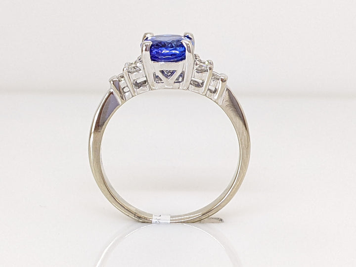 14KW TANZANITE OVAL 1.78 CARAT TOTAL WEIGHT WITH .28 DIAMOND TOTAL WEIGHT RING 4.0 GRAMS