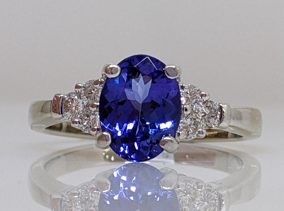 14KW TANZANITE OVAL 1.78 CARAT TOTAL WEIGHT WITH .28 DIAMOND TOTAL WEIGHT RING 4.0 GRAMS