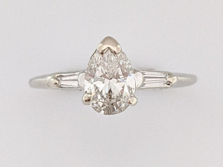 14KW  .77 CARAT TOTAL WEIGHT SI2 I DIAMOND PEAR WITH TWO BAGUETTE MELEE RING 1.7 GRAMS