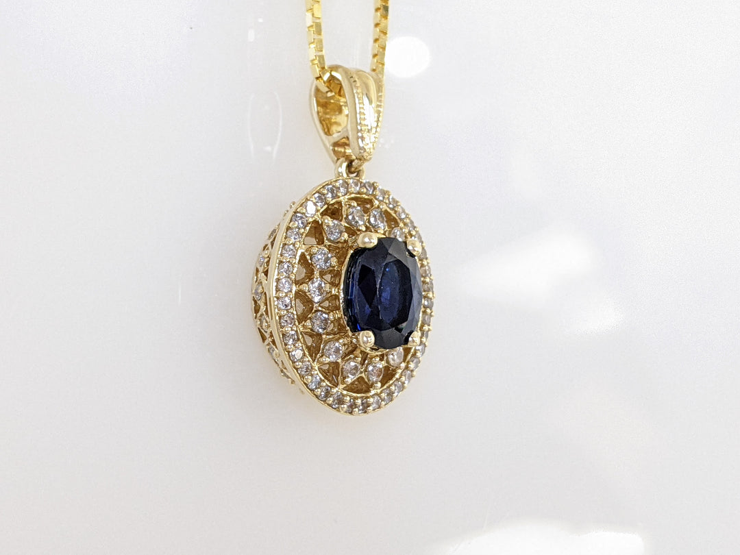14K SAPPHIRE OVAL 6X8 WITH .67 DIAMOND TOTAL WEIGHT ESTATE 8.4 GRAMS