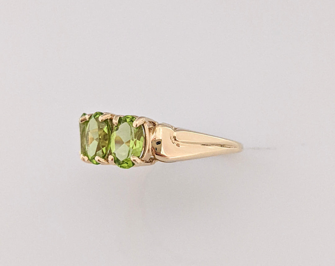 10K PERIDOT OVAL (3) 5X7 ESTATE RING 2.7 GRAMS