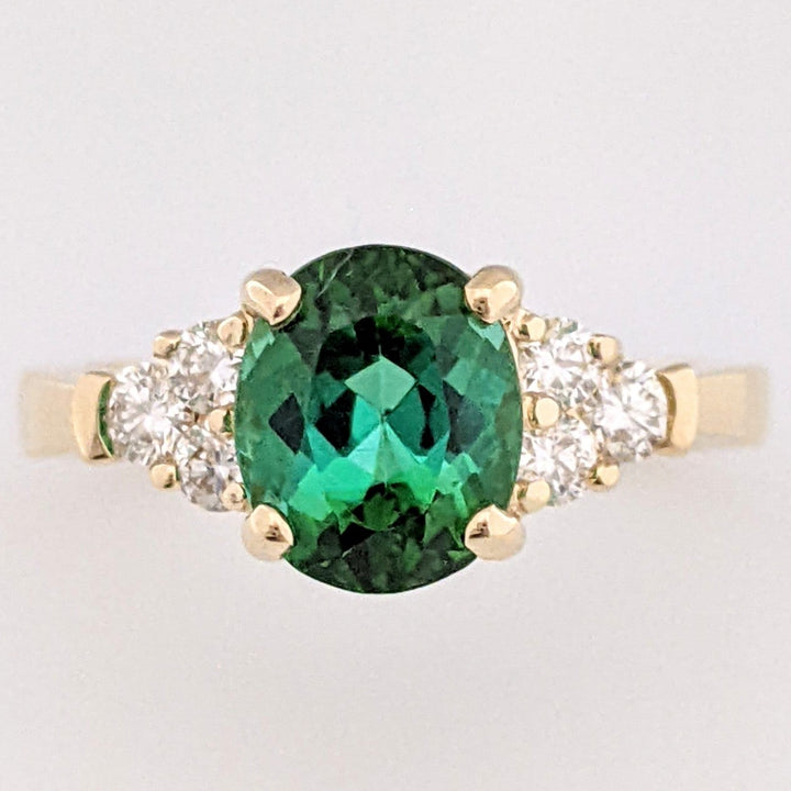 14K GREEN TOURMALINE OVAL 1.92 CARAT TOTAL WITH .29 DIAMOND TOTAL WEIGHT ESTATE RING 4.0 GRAMS