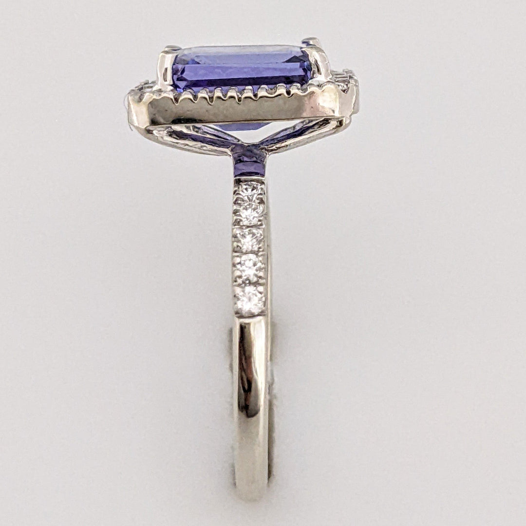 14K WHITE TANZANITE "A" EMERALD CUT 6.5X8.6 WITH .48 DIAMOND TOTAL WEIGHT HALO ESTATE RING 3.3 GRAMS