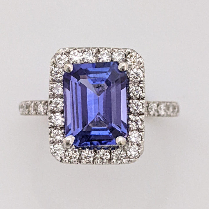 14K WHITE TANZANITE "A" EMERALD CUT 6.5X8.6 WITH .48 DIAMOND TOTAL WEIGHT HALO ESTATE RING 3.3 GRAMS