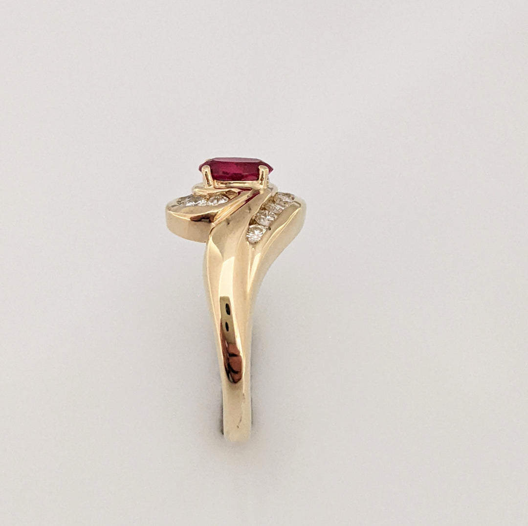 14K RUBY OVAL 4X6 WITH/.28DTW BYPASS ESTATE RING 4.3 GRAMS