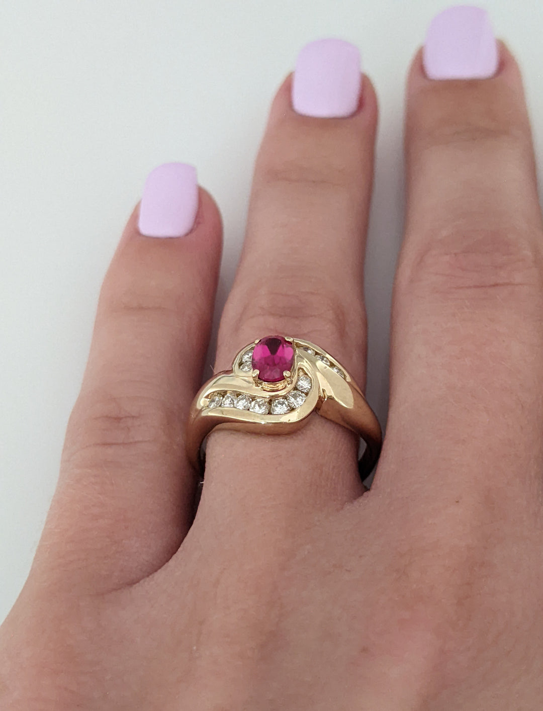14K RUBY OVAL 4X6 WITH/.28DTW BYPASS ESTATE RING 4.3 GRAMS