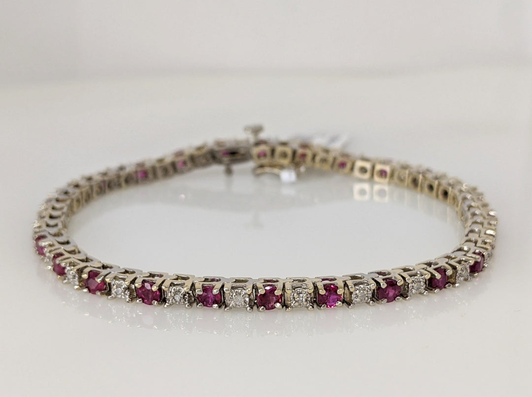 14K WHITE RUBY ROUND (26) 275MM WITH (26) MELEE ESTATE BRACELET 12.1 GRAMS