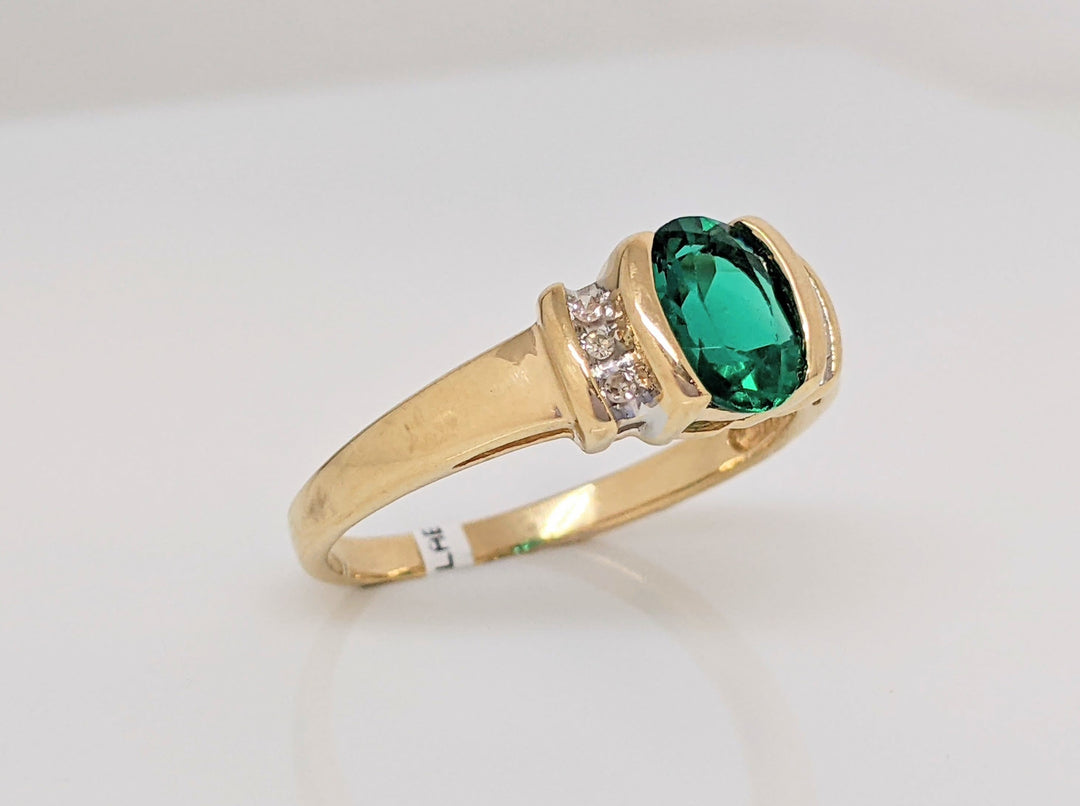 14K LAB-CREATED EMERALD OVAL 6X7 HALF BEZEL WITH .10 DIAMOND TOTAL WEIGHT ESTATE RING 2.9 GRAMS