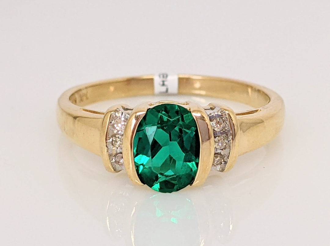 14K LAB-CREATED EMERALD OVAL 6X7 HALF BEZEL WITH .10 DIAMOND TOTAL WEIGHT ESTATE RING 2.9 GRAMS