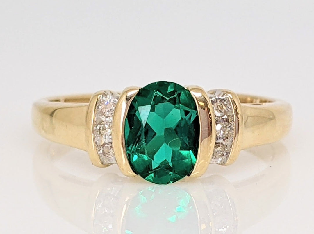 14K LAB-CREATED EMERALD OVAL 6X7 HALF BEZEL WITH .10 DIAMOND TOTAL WEIGHT ESTATE RING 2.9 GRAMS