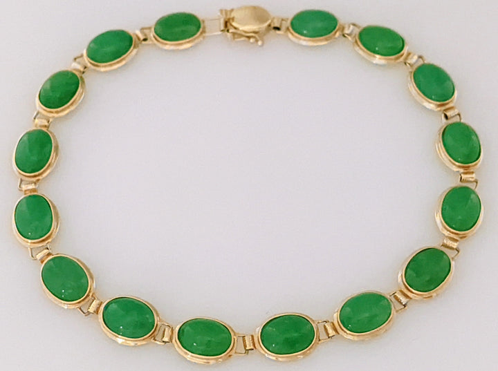 14K JADE OVAL 5X7 (16) ESTATE JADE BRACELET 6.4 GRAMS