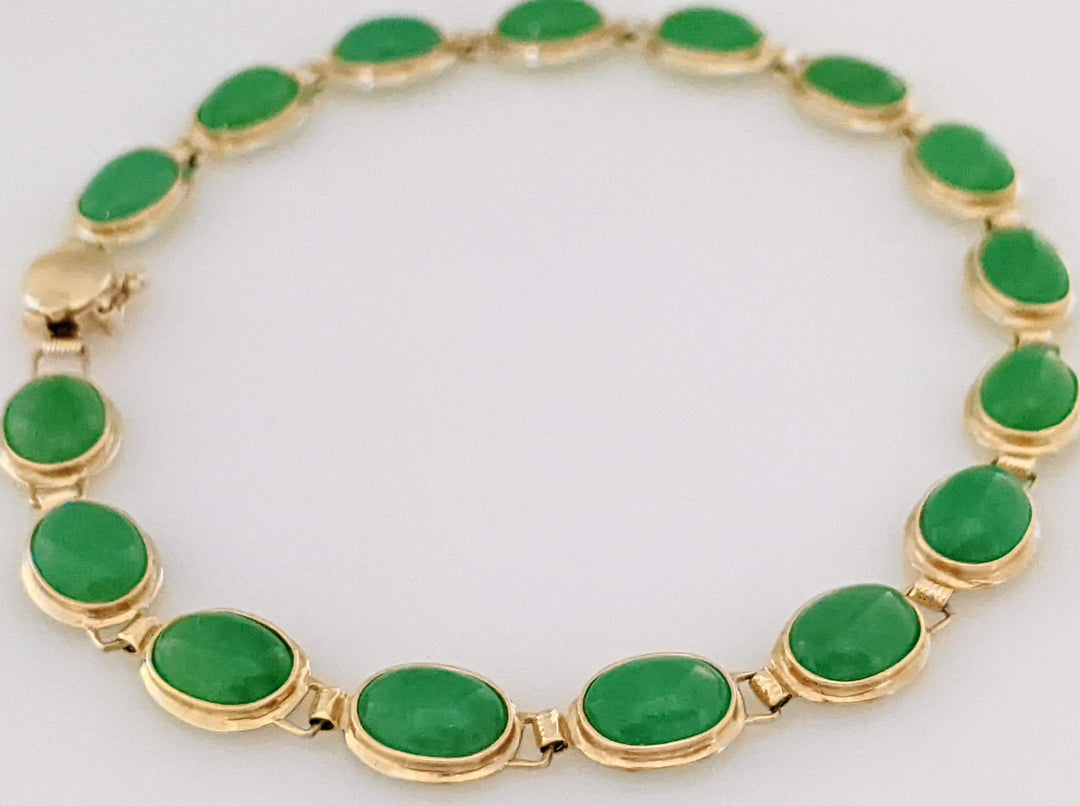 14K JADE OVAL 5X7 (16) ESTATE JADE BRACELET 6.4 GRAMS