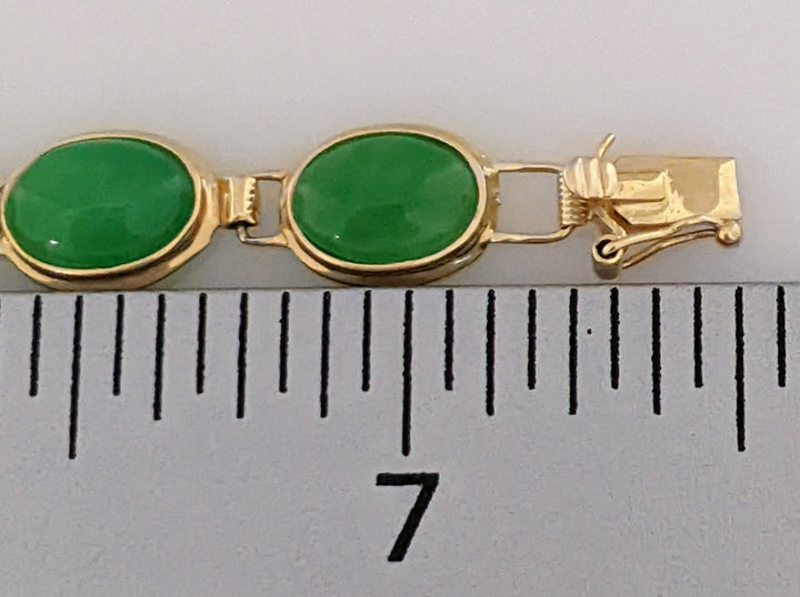 14K JADE OVAL 5X7 (16) ESTATE JADE BRACELET 6.4 GRAMS