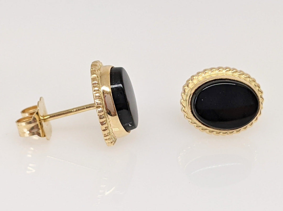 14K ONYX OVAL 6X8 WITH GOLD TRIM ESTATE EARRINGS 1.8 GRAMS