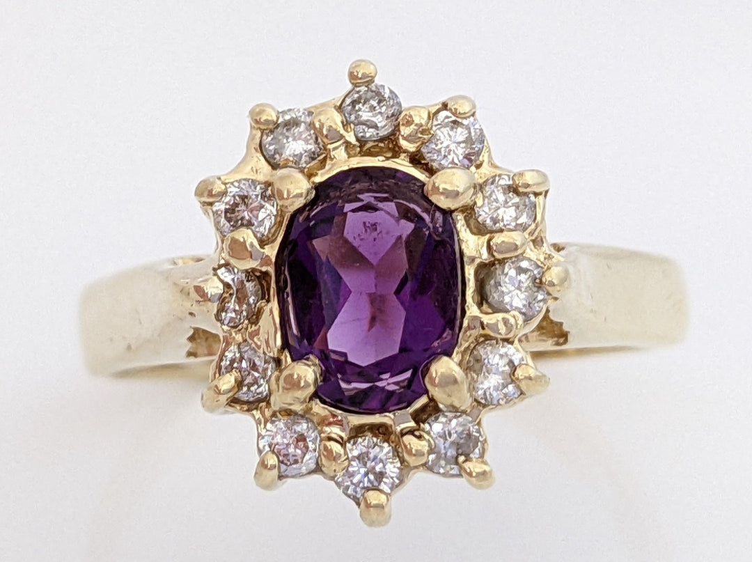 14K AMETHYST OVAL 5X7 WITH .24 DIAMOND TOTAL WEIGHT (12) ESTATE RING 4.6 GRAMS