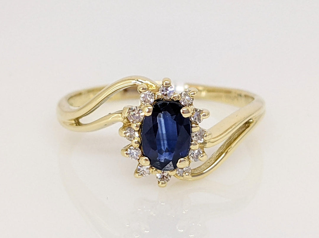 14K SAPPHIRE OVAL "A" WITH .10 DIAMOND TOTAL WEIGHT (12) ESTATE BYPASS RING 2.2 GRAMS