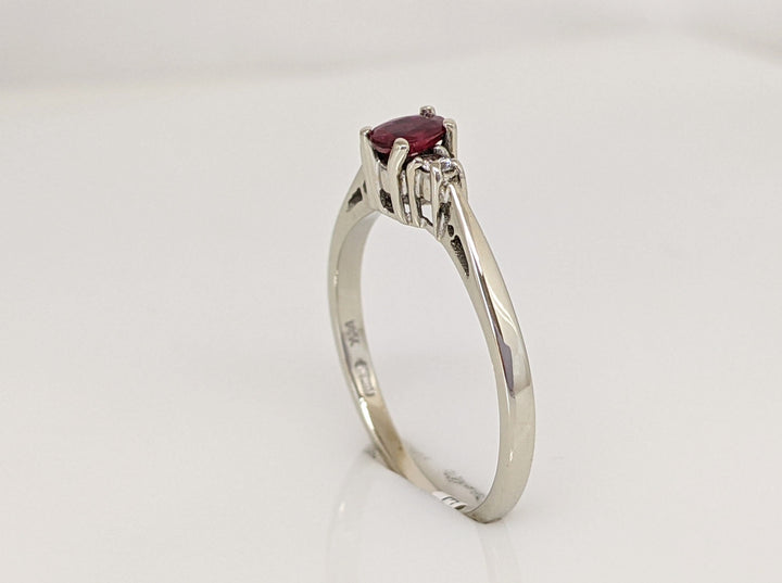 14K WHITE RUBY OVAL 3X4 WITH (2) MELEE ESTATE RING 1.4 GRAM