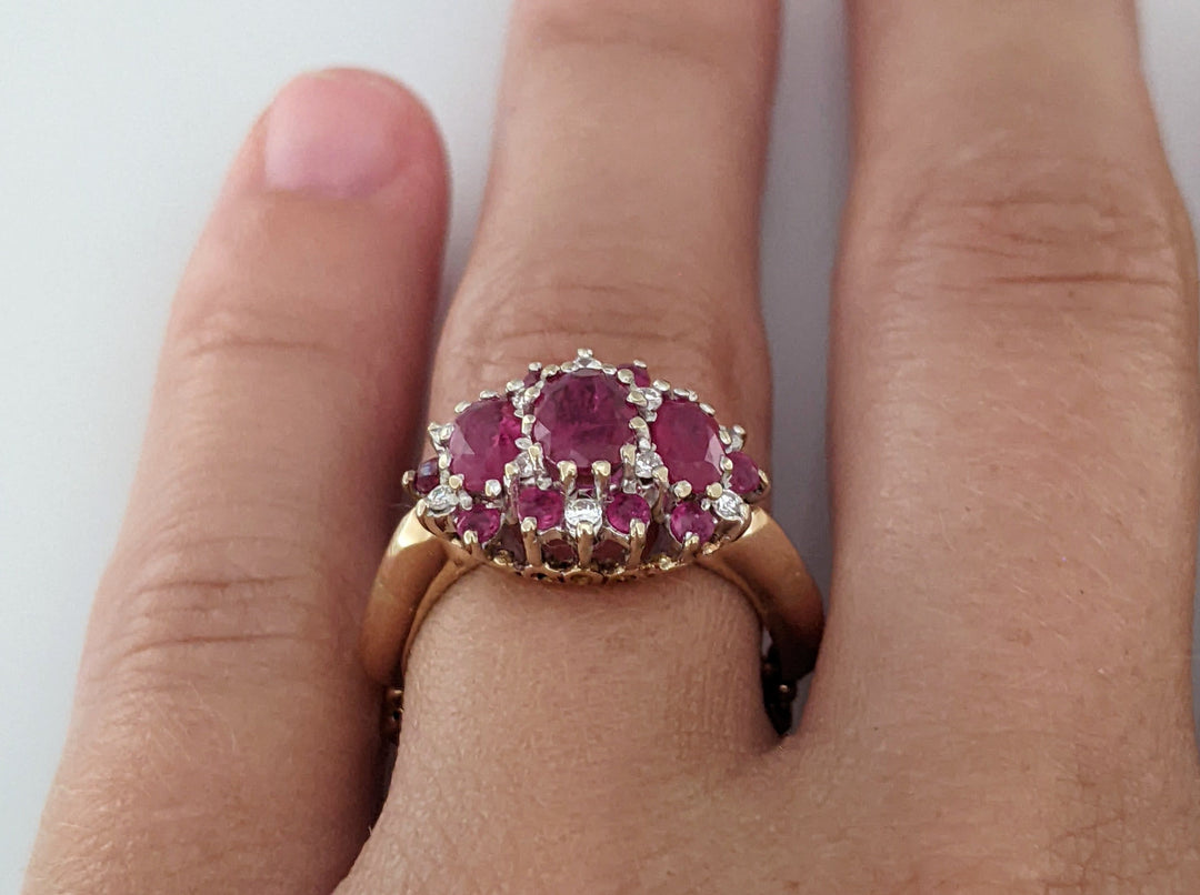 14K RUBY OVAL (1) 4X6 (2) 3X5 WITH .10 DIAMOND TOTAL WEIGHT (2) ESTATE RING 4.3 GRAMS ADJUSTABLE