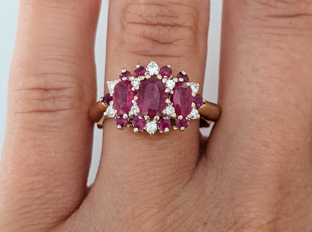 14K RUBY OVAL (1) 4X6 (2) 3X5 WITH .10 DIAMOND TOTAL WEIGHT (2) ESTATE RING 4.3 GRAMS ADJUSTABLE