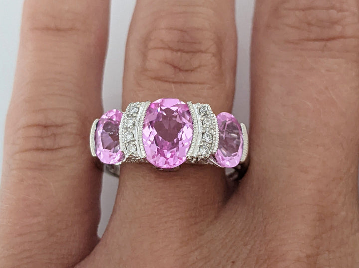 14K WHITE LAB-CREATED PINK SAPPHIRE OVAL (3) WTH .20 DIAMOND TOTAL WEIGHT HALF BEZEL ESTATE RING 4.2 GRAMS