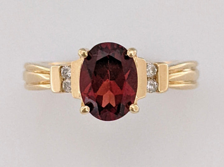 14K GARNET OVAL 6X8 WITH (4) MELEE ESTATE RING 2.7 GRAMS