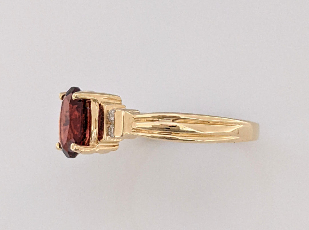 14K GARNET OVAL 6X8 WITH (4) MELEE ESTATE RING 2.7 GRAMS