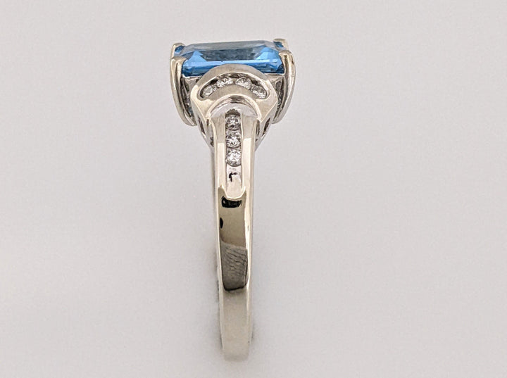 14K WHITE BLUE TOPAZ EMERALD CUT 7X9 WITH (14) MELEE ESTATE RING 4.2 GRAMS