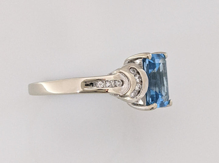 14K WHITE BLUE TOPAZ EMERALD CUT 7X9 WITH (14) MELEE ESTATE RING 4.2 GRAMS