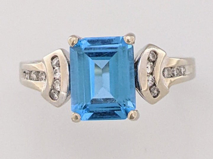 14K WHITE BLUE TOPAZ EMERALD CUT 7X9 WITH (14) MELEE ESTATE RING 4.2 GRAMS