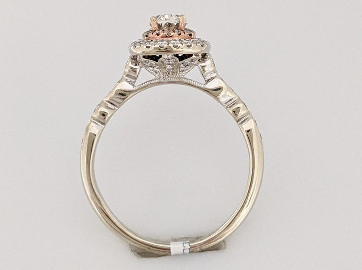 14K TWO-TONE 1.48 CARAT TOTAL WEIGHT SI1-SI2 G-H DIAMOND OVAL WITH (67) ROUND ESTATE RING 5.1 GRAMS