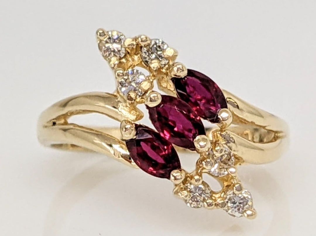 14K RUBY MARQUISE (3) 2.5X4 WITH .12 DIAMOND TOTAL WEIGHT I1 I (6) ROUND ESTATE RING 3.1 GRAMS