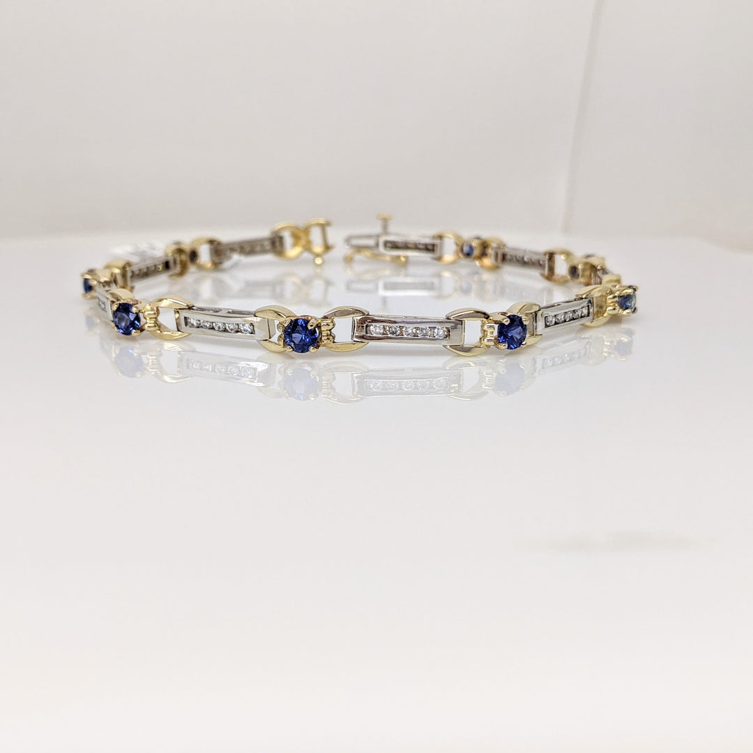 14K TWO TONE LAB CREATED SAPPHIRE ROUND (8) 4MM WITH .67CTW ESTATE BRACELET 12.7 GRAMS