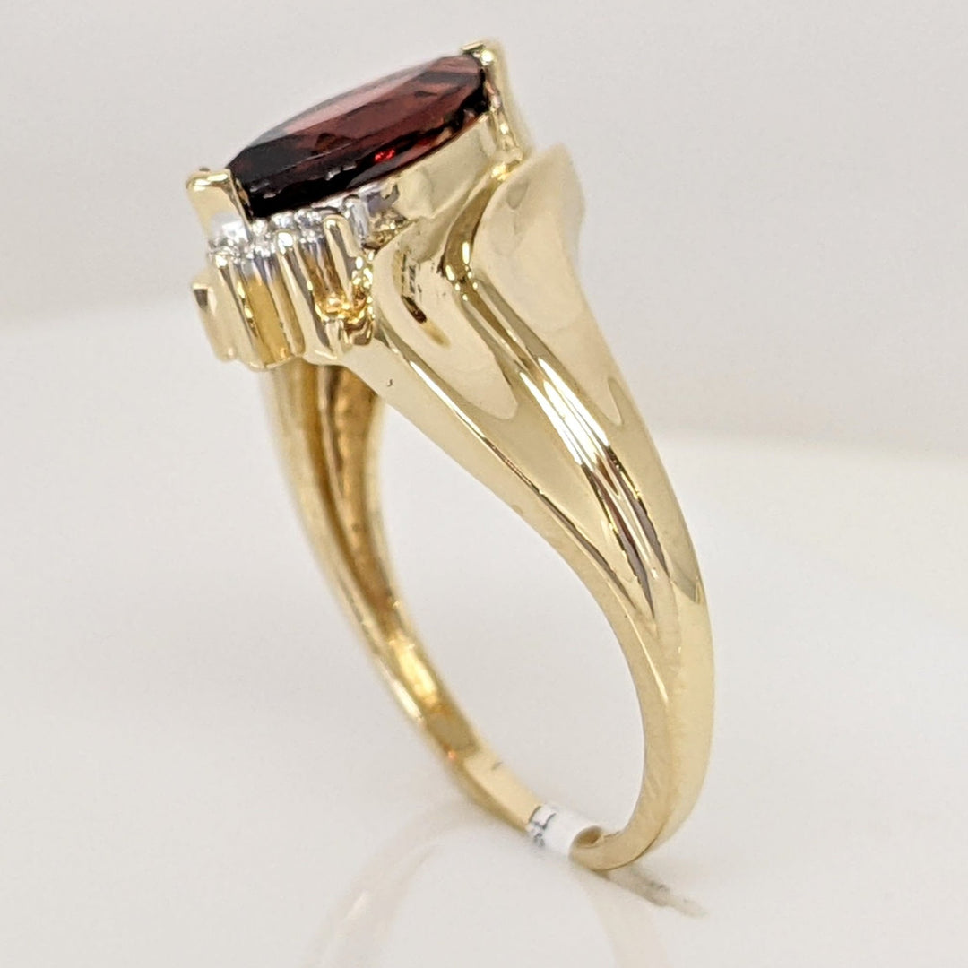 10K GARNET MARQUISE 5X10 WITH (2) MELEE ESTATE RING 2.7 GRAMS