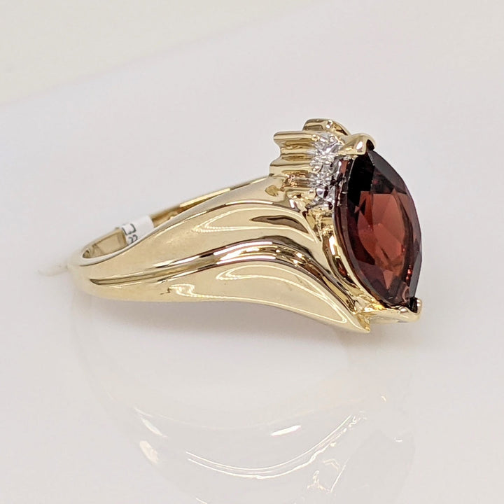 10K GARNET MARQUISE 5X10 WITH (2) MELEE ESTATE RING 2.7 GRAMS