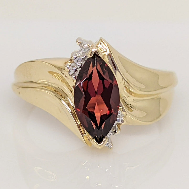 10K GARNET MARQUISE 5X10 WITH (2) MELEE ESTATE RING 2.7 GRAMS