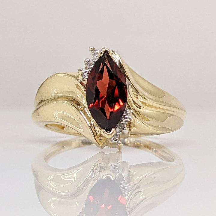 10K GARNET MARQUISE 5X10 WITH (2) MELEE ESTATE RING 2.7 GRAMS