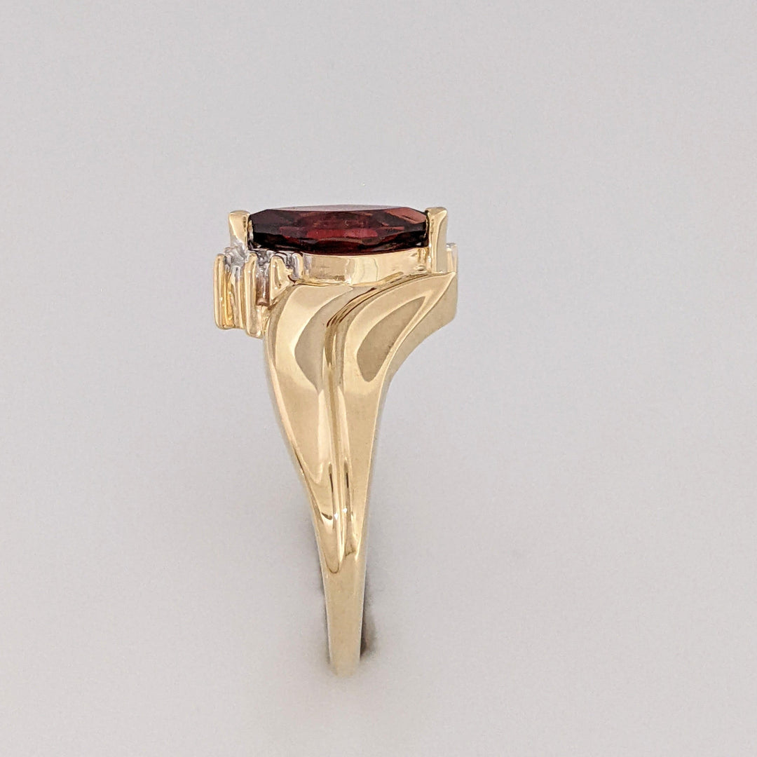 10K GARNET MARQUISE 5X10 WITH (2) MELEE ESTATE RING 2.7 GRAMS