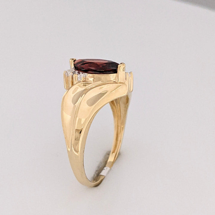 10K GARNET MARQUISE 5X10 WITH (2) MELEE ESTATE RING 2.7 GRAMS