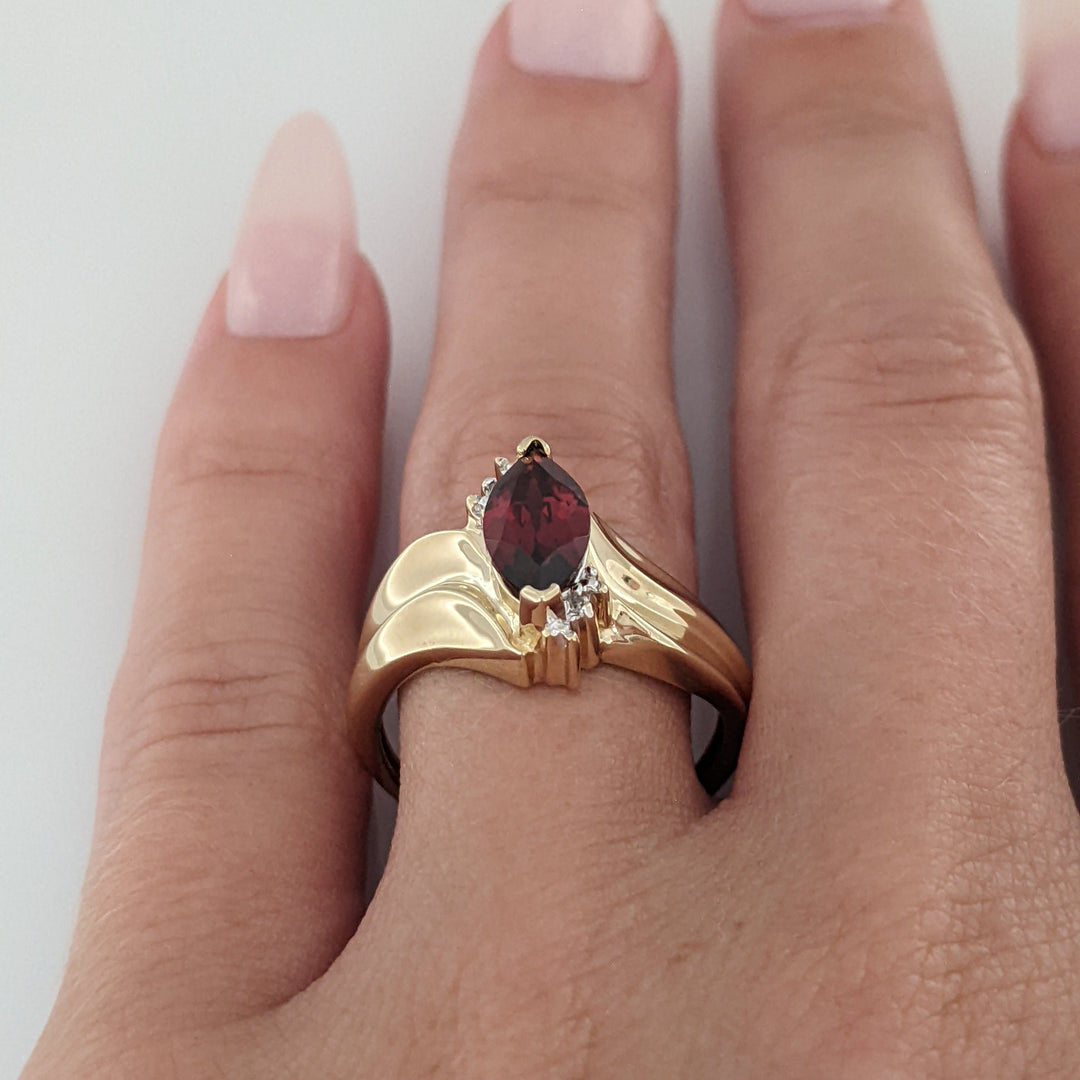 10K GARNET MARQUISE 5X10 WITH (2) MELEE ESTATE RING 2.7 GRAMS