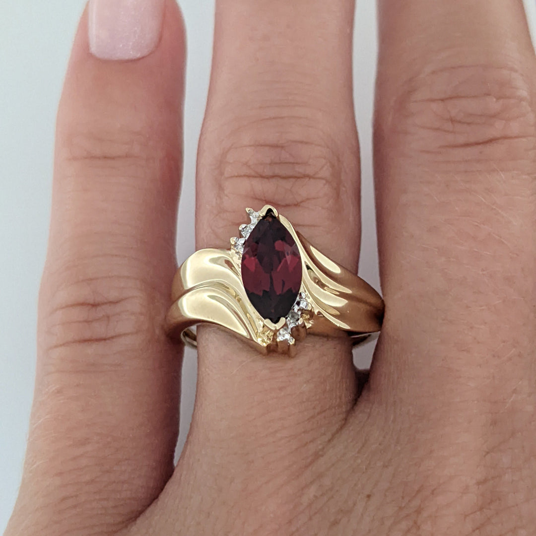 10K GARNET MARQUISE 5X10 WITH (2) MELEE ESTATE RING 2.7 GRAMS