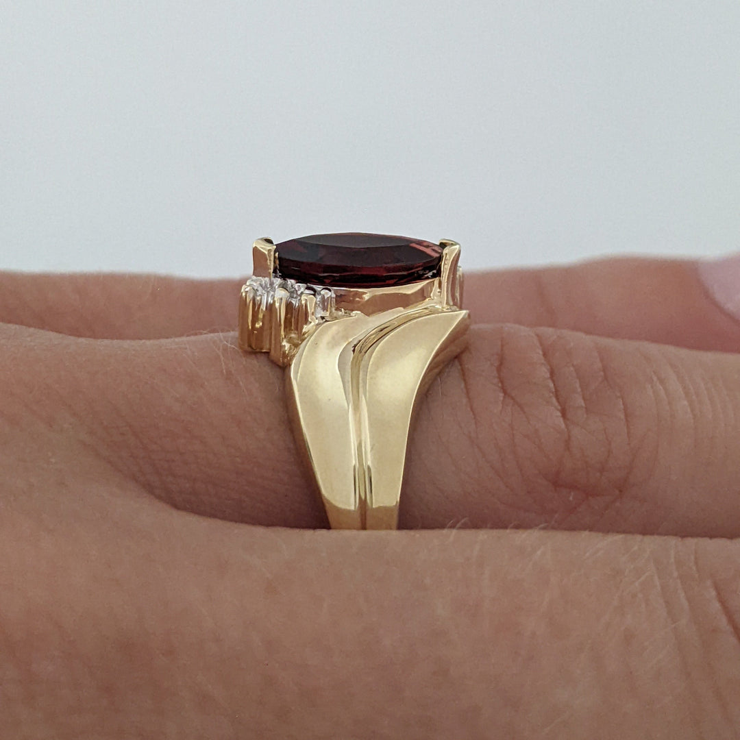 10K GARNET MARQUISE 5X10 WITH (2) MELEE ESTATE RING 2.7 GRAMS