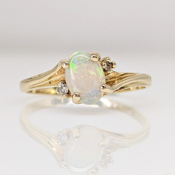 10K OPAL OVAL 5X7 WITH (2) DIAMONDS ESTATE RING 1.5 GRAMS