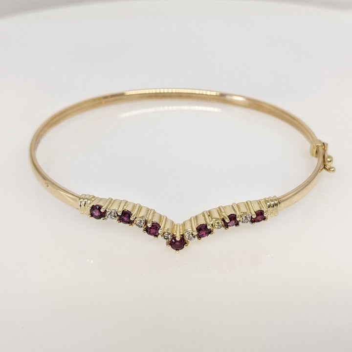 14K RUBY ROUND (7) 2.8-3MM WITH (6) MELEE ESTATE V BANGLE 6.0 GRAMS